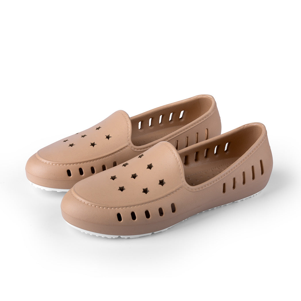 Water shoe slip on for girls and teens in sand color with perforated stars