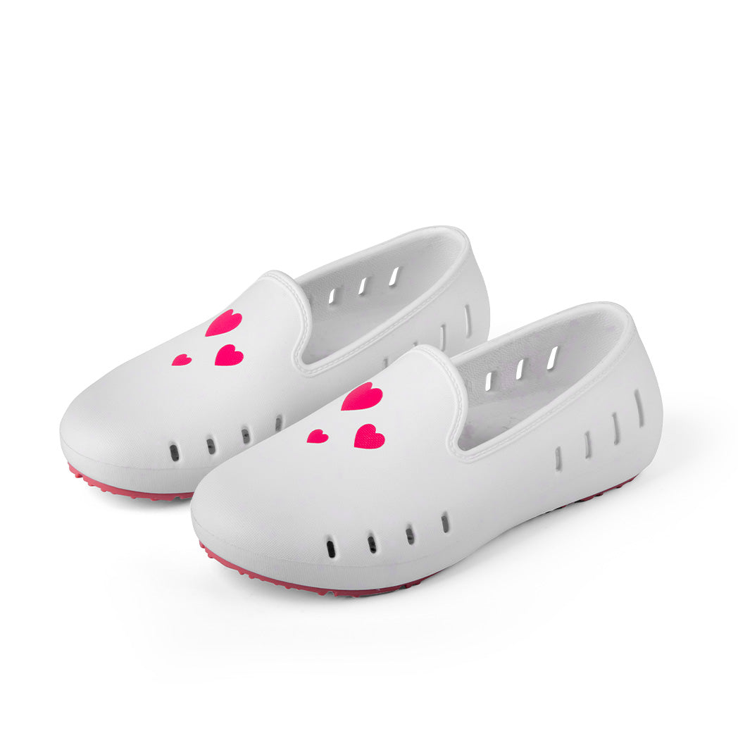 Toddler girl white slip on shoe with pink hearts and sole. summer white sandal